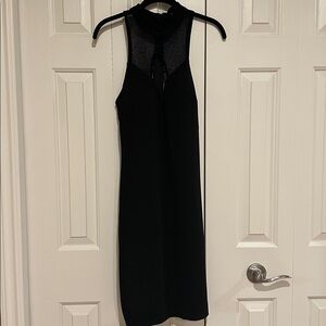 NWT black cocktail dress with sheer chest detail, junior size 9